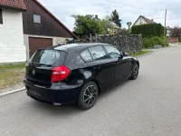 Second-hand BMW 116 122 CP (89 kW) 2009 Negru Hatchback