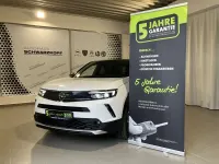 Gebraucht Opel Mokka-e 100 kW (136 PS) 2022 Jade weiss/arktis weiss SUV