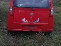 Gebraucht Daihatsu Cuore Plus 58 PS (42 kW) 2003 Rot Kleinwagen