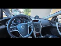 Second-hand Opel Astra Edition 101 CP (74 kW) 2012 Gri Berlinǎ