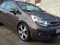 Gebraucht Kia Rio 90 PS (66 kW) 2013 Braun Limousine