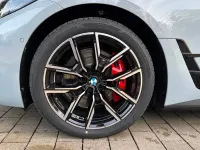 Gebraucht BMW i4 Comfort Edition 250 kW (340 PS) 2026 M brooklyn grau metallic Limousine