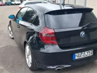 Gebraucht BMW 116 122 PS (89 kW) 2009 Schwarz Kleinwagen