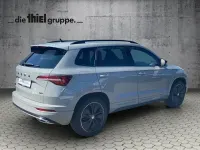 Gebraucht Skoda Karoq SportLine 190 PS (139 kW) 2023 Grau SUV