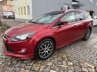 Gebraucht Ford Focus Titanium 125 PS (91 kW) 2013 Candyrot metallic Kombi