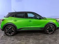 Gebraucht Opel Mokka-e 100 kW (136 PS) 2023 Ikone grün metallic SUV