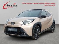 Gebraucht Toyota Aygo X Style 72 PS (52 kW) 2022 Ginger beige metallic/ night sky black SUV