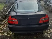 Begagnad Mitsubishi Carisma 103 HK (75 kW) 2004 Svart Sedan