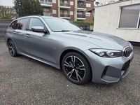 Gebraucht BMW 320e M Sport 163 PS (119 kW) 2023 Skyscraper grau metallic Kombi