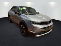 Gebraucht Opel Mokka-e Ultimate 100 kW (136 PS) 2022 Kontrast grau/quarz silber SUV