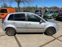 Używany Ford Fiesta 80 KM (58 kW) 2005 Srebrny Hatchback