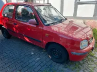Używany Nissan Micra 54 KM (39 kW) 1999 Czerwony Hatchback
