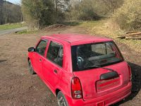 Gebraucht Daihatsu Cuore 56 PS (41 kW) 2002 Rot Kleinwagen