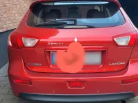 Gebraucht Mitsubishi Lancer 109 PS (80 kW) 2010 Rot Limousine