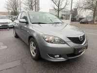 Używany Mazda 3 Comfort 105 KM (77 kW) 2004 Szary Sedan/Limuzyna
