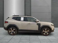 Gebraucht Dacia Duster Journey 141 PS (103 kW) 2024 Beige (sandstonebeige) SUV