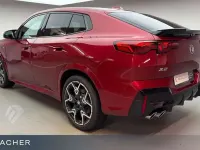 Gebraucht BMW X2 M Sport 300 PS (220 kW) 2025 Fire red metallic SUV