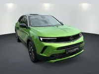 Gebraucht Opel Mokka Elegance 101 PS (74 kW) 2024 Matcha green (metallic) (metallic) SUV