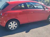 Gebraucht Opel Corsa Edition 69 PS (50 kW) 2014 Rot Kleinwagen