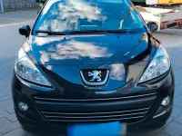 Gebraucht Peugeot 207 95 PS (69 kW) 2011 Schwarz Kleinwagen