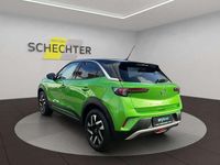 Gebraucht Opel Mokka-e Elegance 100 kW (136 PS) 2021 Matcha grün metallic SUV