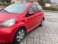 Gebraucht Toyota Aygo 68 PS (50 kW) 2007 Rot Kleinwagen