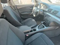 Second-hand BMW 116 122 CP (89 kW) 2008 Negru Hatchback