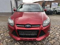 Gebraucht Ford Focus Titanium 125 PS (91 kW) 2013 Candyrot metallic Kombi