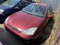 Second-hand Ford Focus Ghia 101 CP (74 kW) 2003 Roșu Berlinǎ