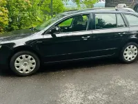 Używany Skoda Superb 125 KM (91 kW) 2013 Czarny Kombi