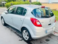 Usado Opel Corsa 101 HP (74 kW) 2013 Prateado Citadino