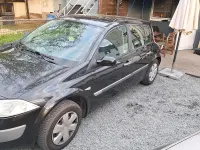 Używany Renault Mégane 110 KM (80 kW) 2004 Czarny Sedan/Limuzyna