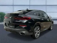 Gebraucht BMW X6 M50 Shadowline 400 PS (294 kW) 2020 Saphirschwarz metallic SUV