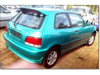 Gebraucht Suzuki Baleno 86 PS (63 kW) 1998 Grün metallic Kleinwagen