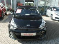 Gebraucht Kia Rio Attract 84 PS (61 kW) 2015 Schwarz metallic Kleinwagen