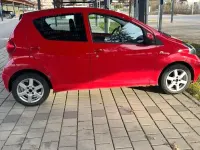 Gebraucht Toyota Aygo 67 PS (49 kW) 2007 Rot Kleinwagen