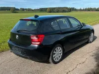 Second-hand BMW 116 136 CP (100 kW) 2011 Negru Hatchback