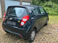 Gebraucht Chevrolet Spark 68 PS (50 kW) 2013 Schwarz Kleinwagen