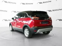 Gebraucht Opel Crossland Ultimate 131 PS (96 kW) 2024 Lackierung peperoncino red/met SUV