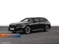 Gebraucht BMW 550e Comfort Edition 489 PS (359 kW) 2025 Black sapphire metallic Kombi
