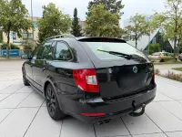 Gebraucht Skoda Superb GreenLine 105 PS (77 kW) 2011 Schwarz Kombi