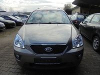Używany Kia Carens 128 KM (94 kW) 2010 Szary Minivan