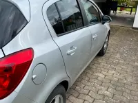 Second-hand Opel Corsa 70 CP (51 kW) 2010 Argintiu Hatchback