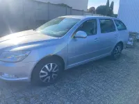 Używany Skoda Octavia Ambiente 122 KM (89 kW) 2010 Srebrny Kombi