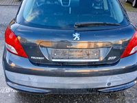 Gebraucht Peugeot 207 73 PS (53 kW) 2011 Schwarz Kleinwagen