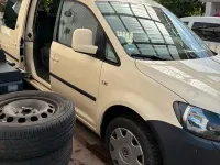 Używany VW Caddy Maxi 102 KM (75 kW) 2014 Żółty Minivan