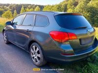 Gebraucht Opel Astra 110 PS (80 kW) 2011 Grau Kombi