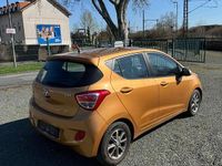Gebraucht Hyundai i10 67 PS (49 kW) 2015 Orange Kleinwagen