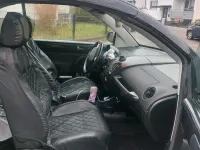 Gebraucht VW New Beetle 75 PS (55 kW) 2009 Schwarz Kleinwagen