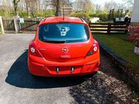 Second-hand Opel Corsa 60 CP (44 kW) 2007 Roșu Hatchback